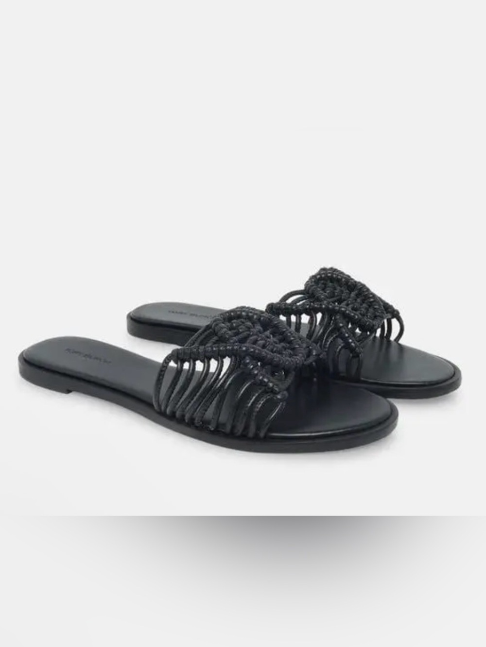 Tory Burch Macrame Flat Sandals featuring a woven black leather upper